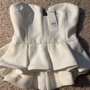 Elegant White Strapless Peplum Top keepsake